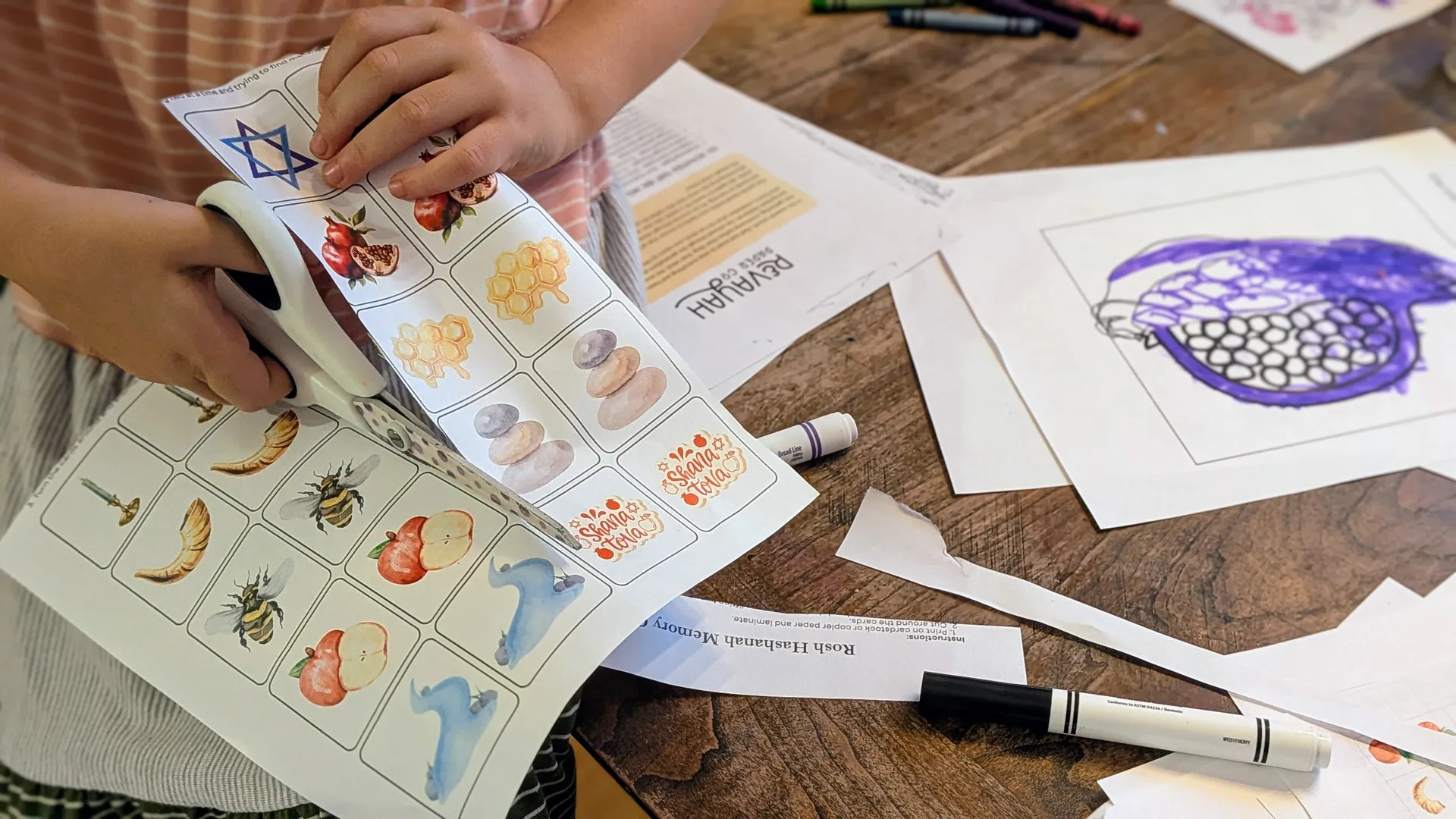 Kids enjoying hands-on Rosh Hashanah printable activities together